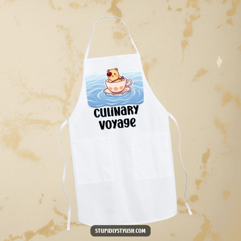Funny apron: hot dog paddling a teacup across the ocean, ideal for humorous kitchen activities.
