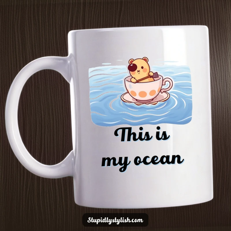 Funny mug: determined hot dog bravely paddling a teacup across wide blue ocean, symbolizing perseverance and humor.