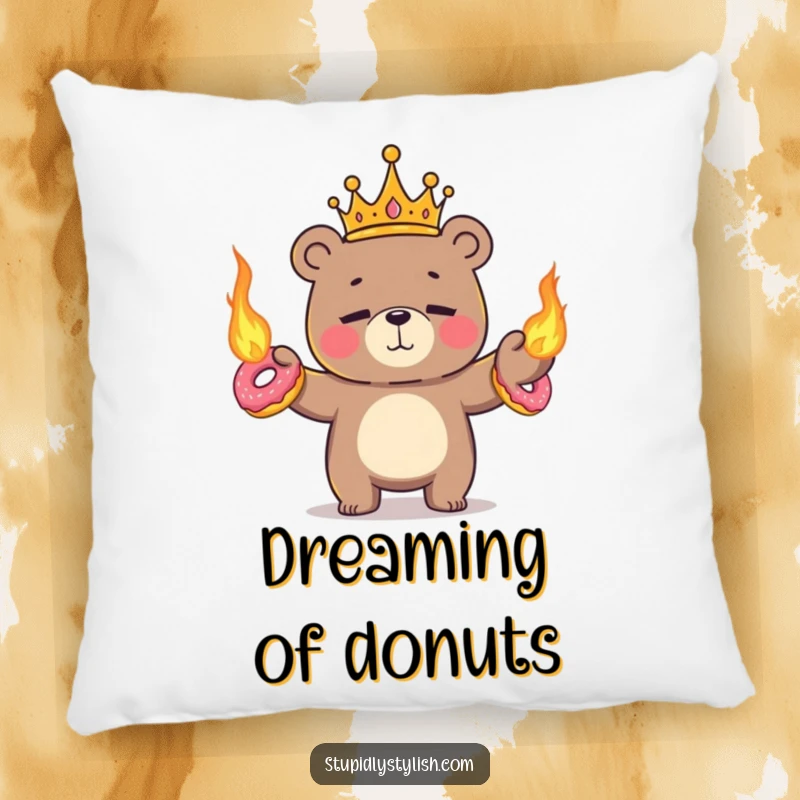 Funny, soft pillow featuring a tiny crowned bear nervously juggling flaming donuts with a nervous, anxious smile.
