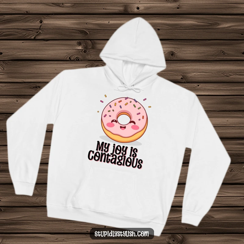 Funny hoodie showing a giggling donut with sprinkles flying outwards, perfect for cozying up with sweet treat humor.