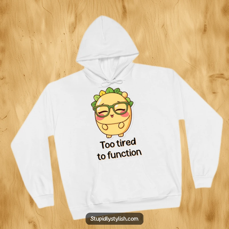 Funny hoodie featuring a sleepy taco character with huge glasses, embodying comfort and the universal need for sleep.