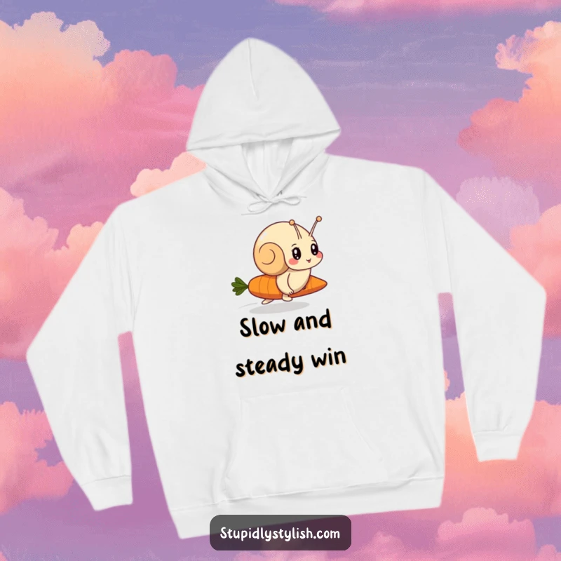 Funny hoodie depicting a determined snail in a comical race against a fast-moving carrot, symbolizing playful ambition.