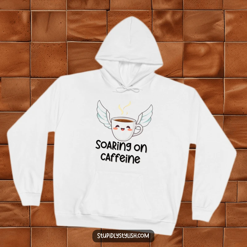 Funny hoodie showing a startled coffee cup with wing-like steam, perfect for cozying up during a humorous and energetic morning.