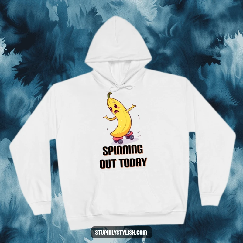 Funny Hoodie depicting a bewildered banana comically spinning out of control on roller skates, a symbol of hilarious, chaotic fun.