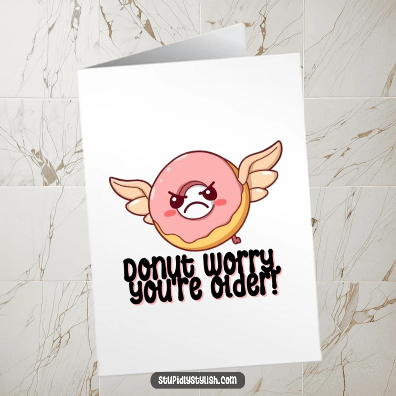 Funny free printable birthday card: A grumpy donut with pastry wings tries to fly, looking totally flustered.