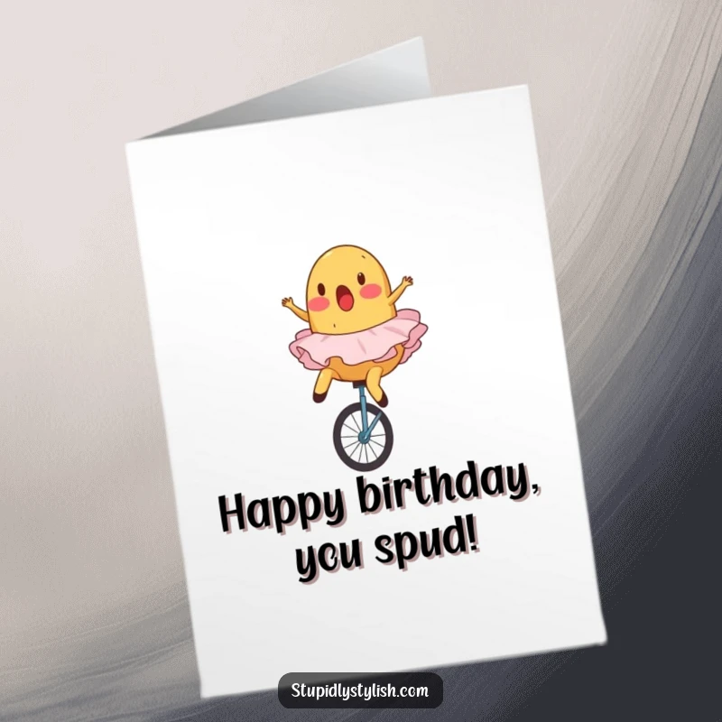 Funny Free Printable Birthday Card: A surprised potato in a ballet tutu comically falling off a unicycle, mid-tumble.