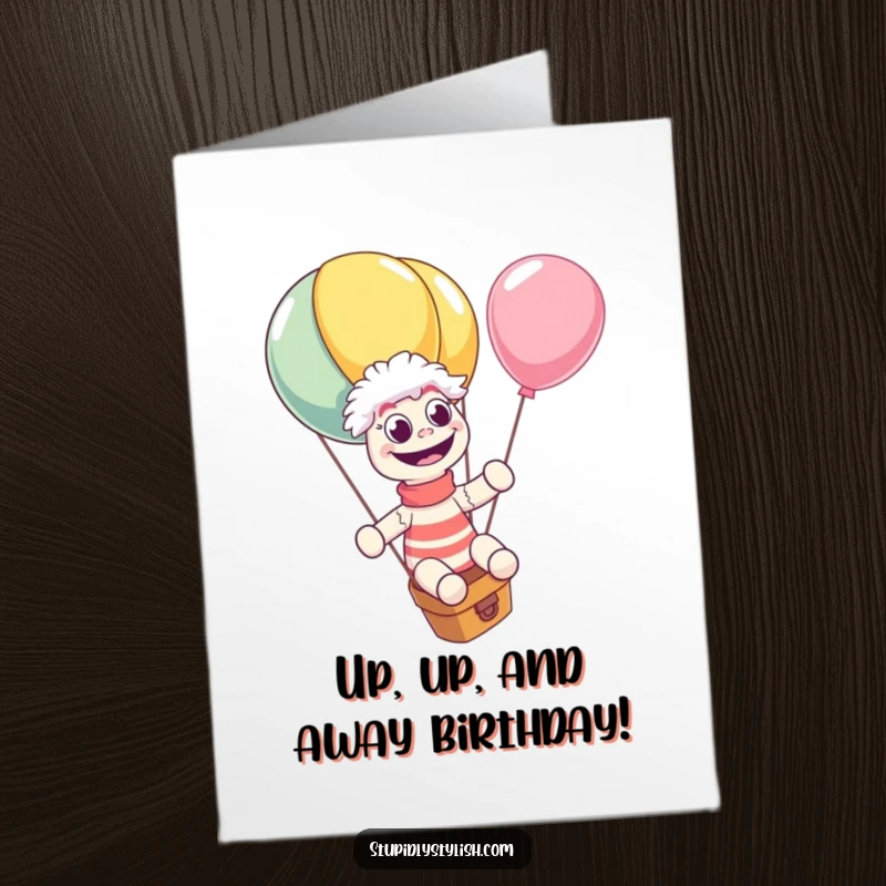Funny Free Printable Birthday Card: Giggling sock puppet joyfully rides a giant runaway balloon, eyes wide with delight.