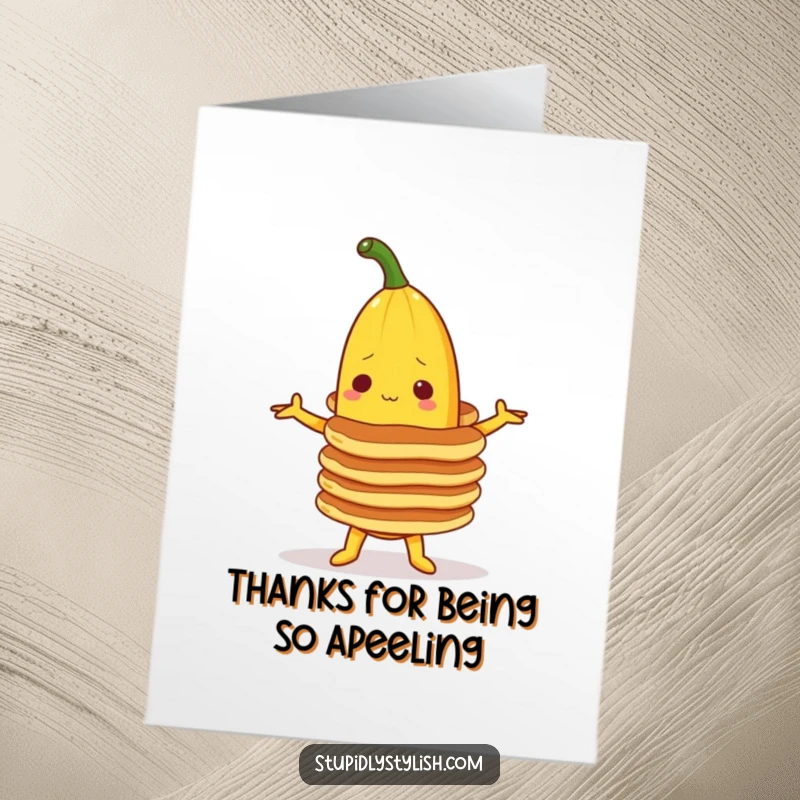 Funny Free Printable Thank You Card with a banana character carefully balancing a stack of pancakes as a thank you.