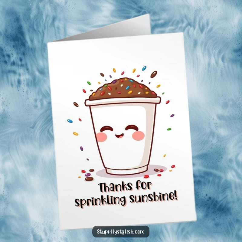 Funny free printable thank you card: A coffee cup character joyfully sneezes a large cascade of colorful sprinkles for a sweet thank you.