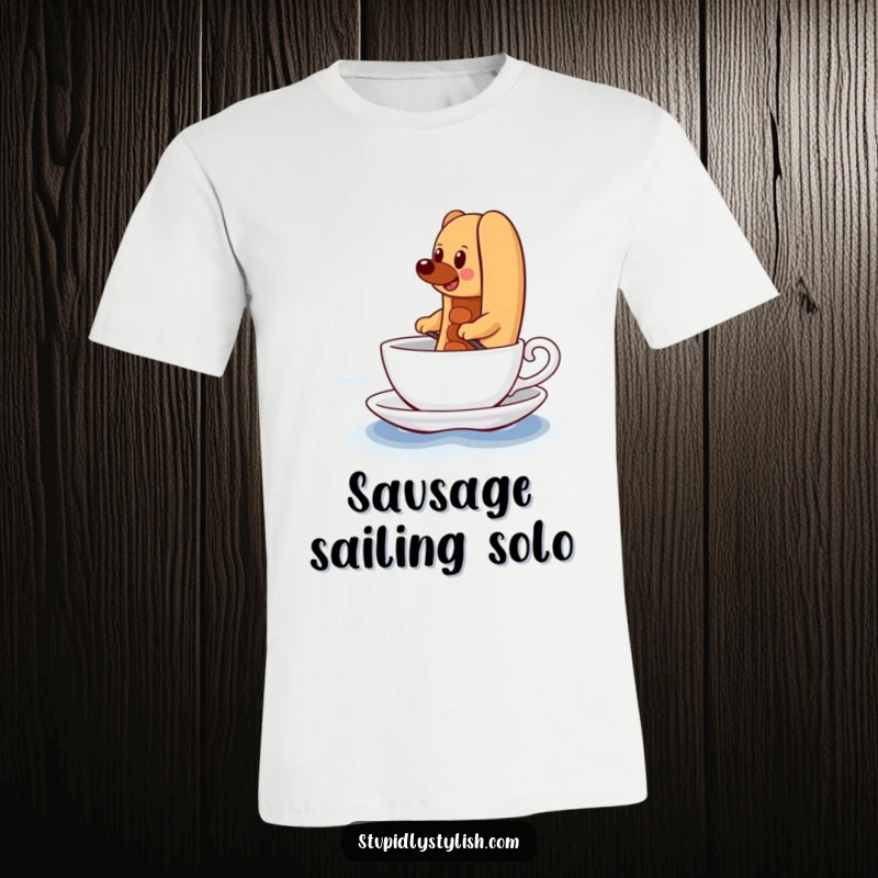 Funny T-Shirt featuring a determined hot dog comically paddling a teacup across a vast ocean, illustrating unwavering perseverance.