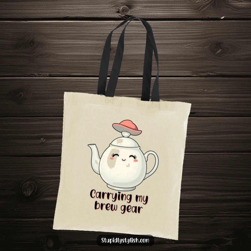 Funny tote bag illustrating a stylish teapot character sporting a tiny, chic hat, a whimsical and functional accessory.