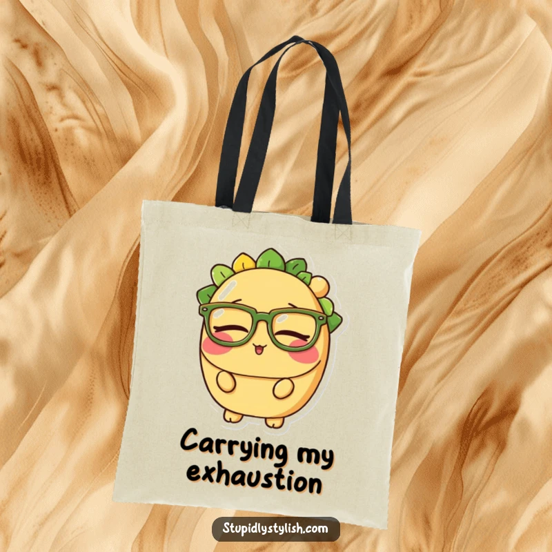 Funny tote bag with a sleepy taco character wearing large glasses, perfect for carrying essentials while dreaming of naps.