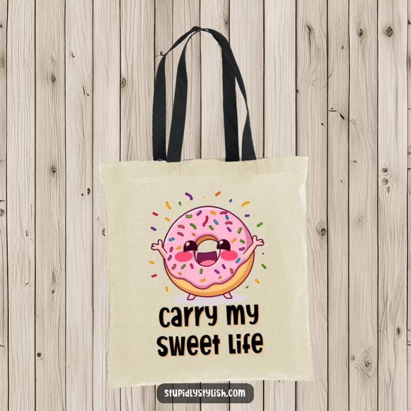Funny Tote Bag depicting an excited donut juggling colorful sprinkles, perfect for carrying essentials while showcasing a love for sweets and fun.