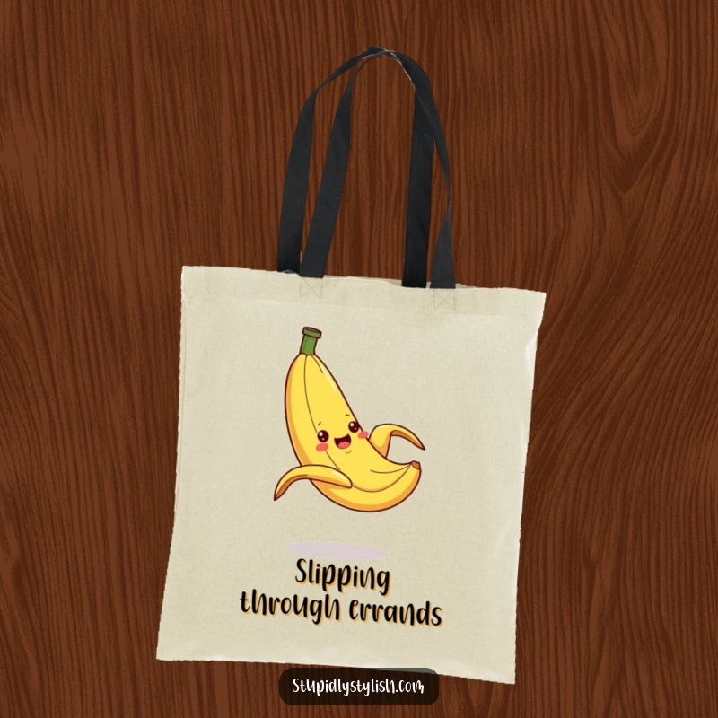 Funny Tote Bag showing a silly banana dramatically slipping on a peel, perfect for carrying essentials while adding comical, cartoon-inspired humor.